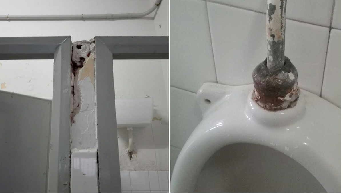 Desconchón en los marcos de una de las puertas del centro y estado de los urinarios. | L.N.C.
