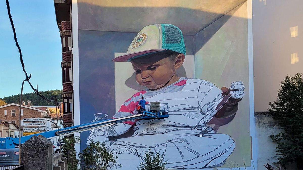 Da2.0 realizando su obra 'Alex', una de las nominadas a 'mejor mural del mundo'. | STREET ART CITIES