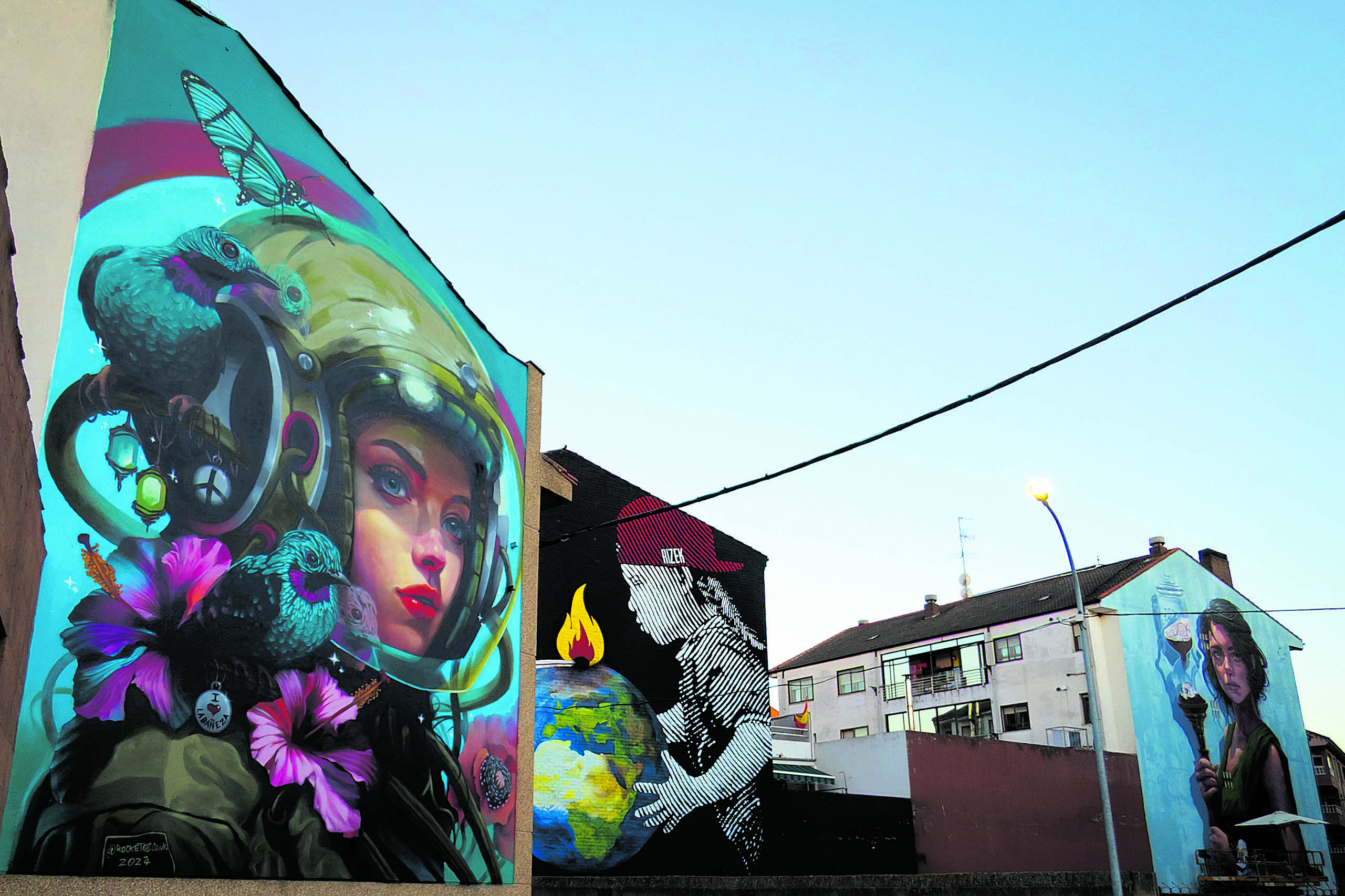 Tres de los 19 murales pintados este año en el Festival de Arte Urbano. L.N.C.