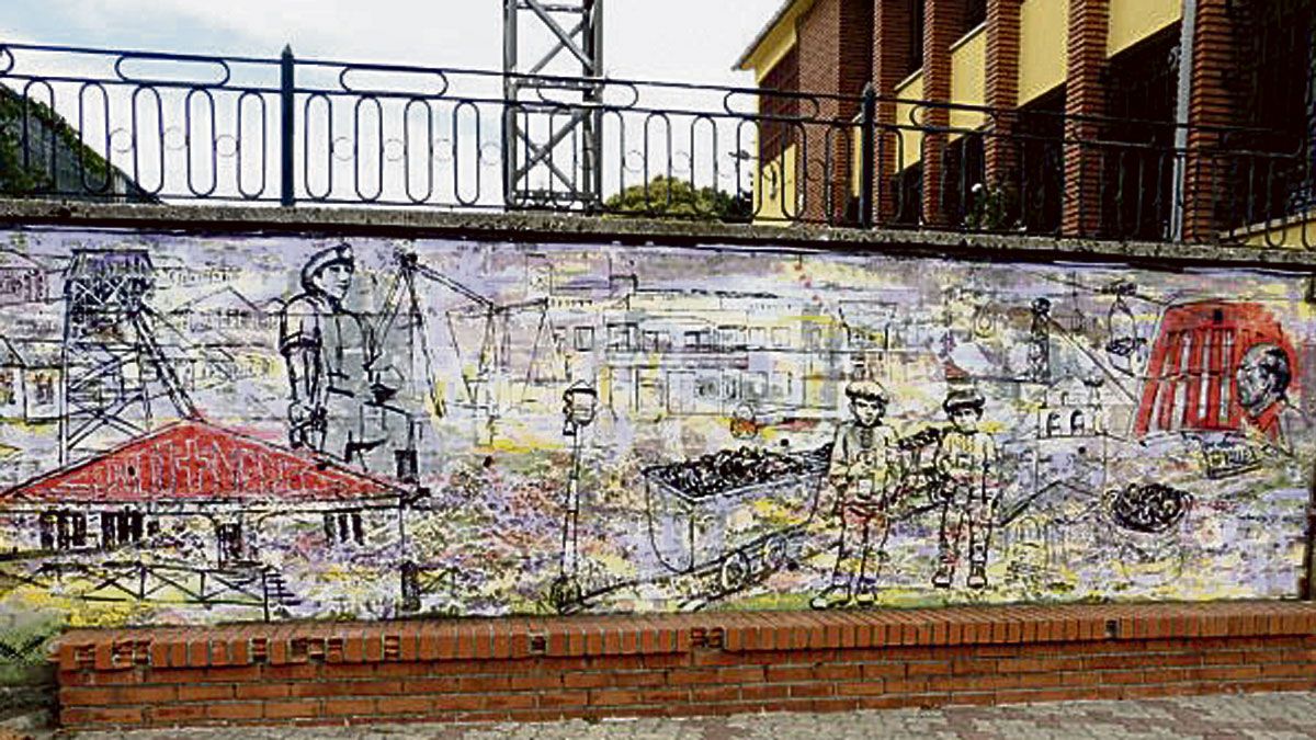 Referencias a la minería en el mural artístico que la artista ucraniana está realizando sobre una pared del parque de Fabero.