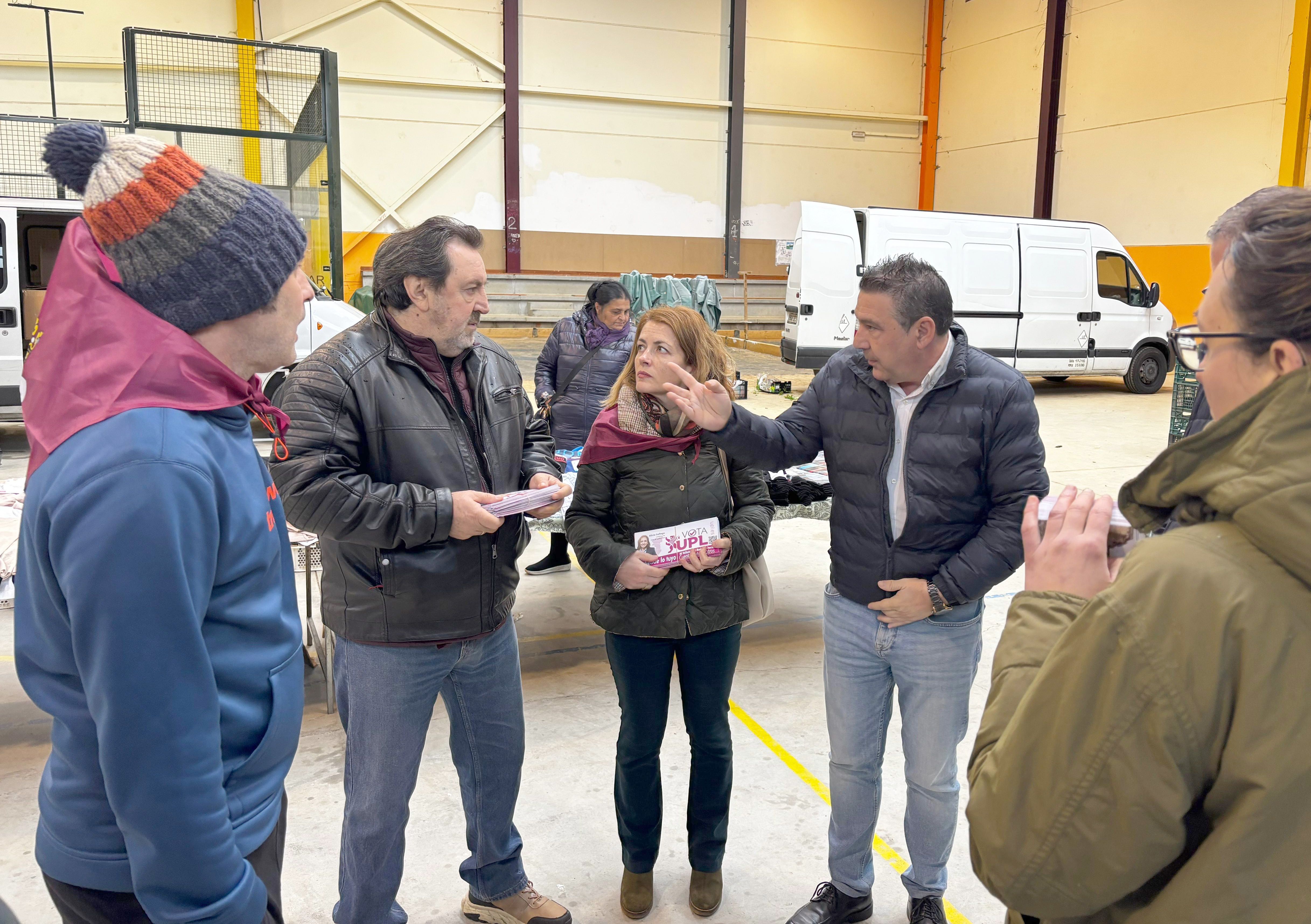 Un instante de la visita de Santos