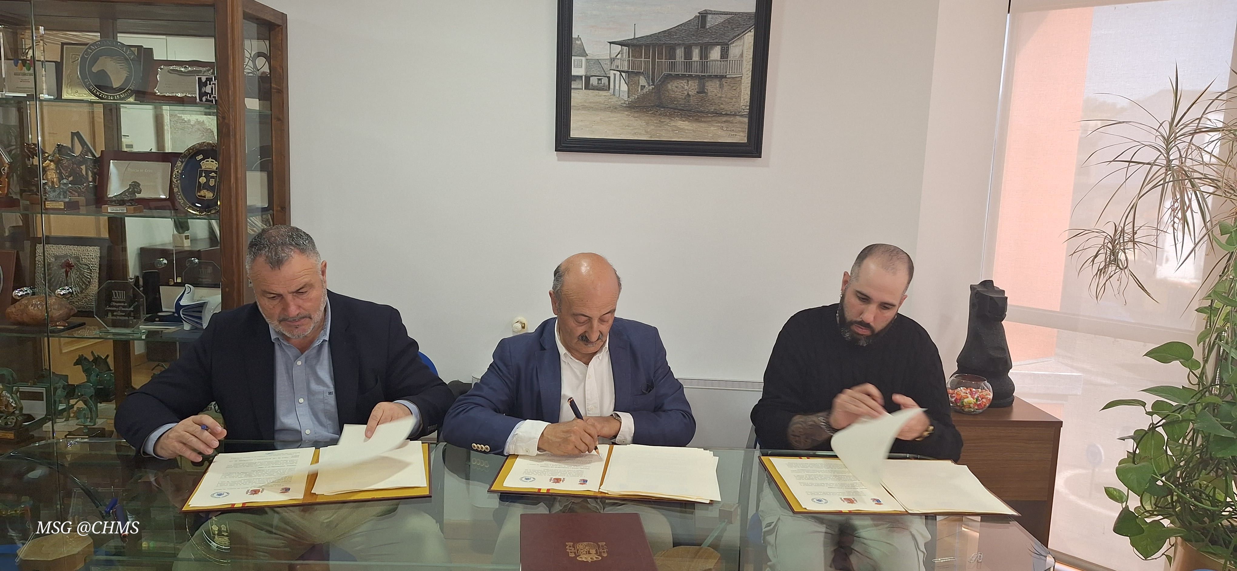 Firma del convenio entre las partes.