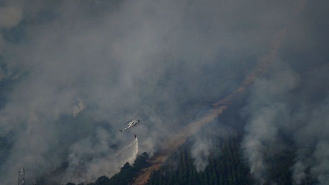 Trabajos de extinción aérea llegada la mañana.ICAL Trabajos de extinción aérea llegada la mañana.ICAL