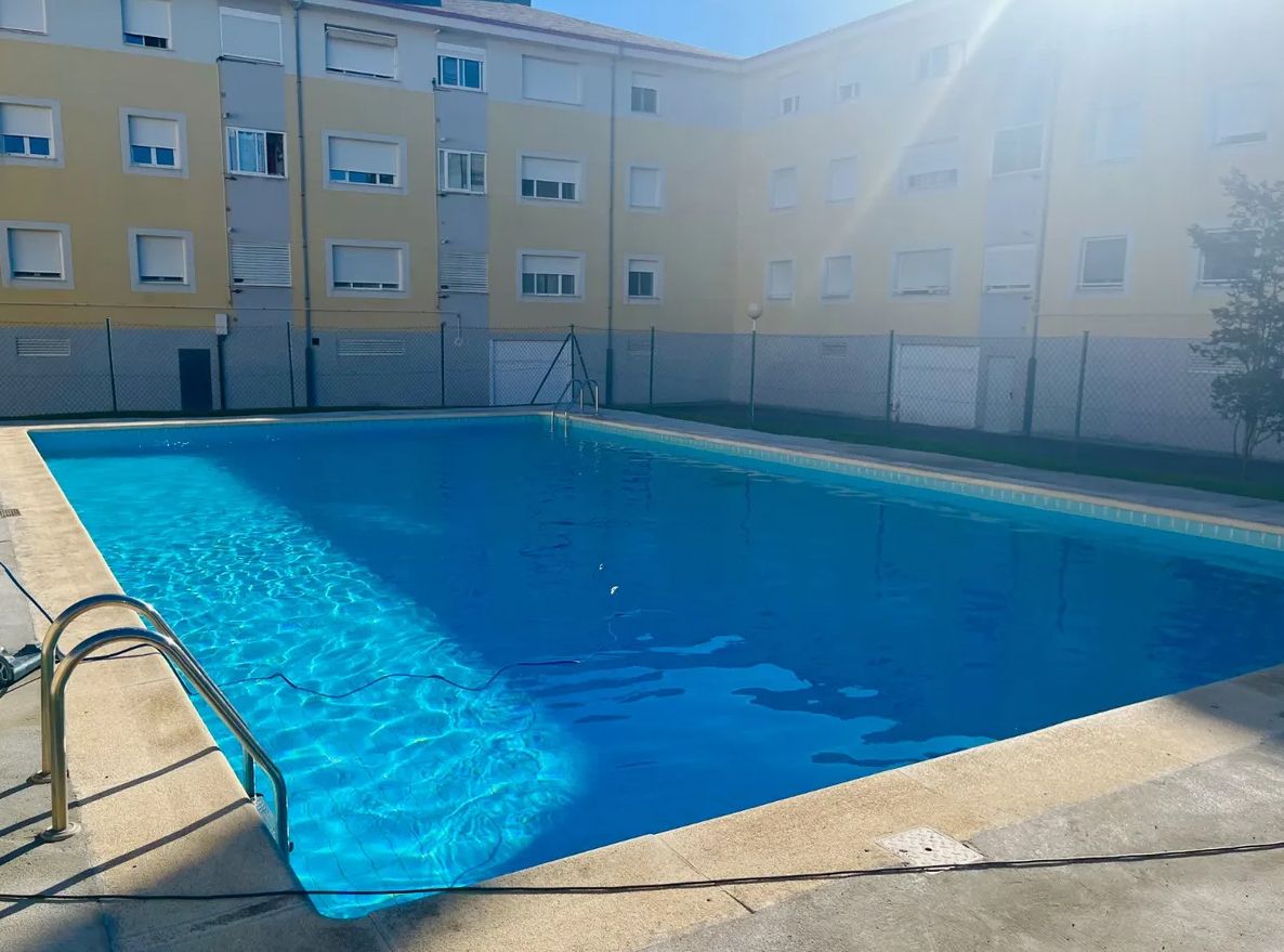 Imagen de una comunidad con piscina