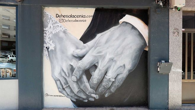 Un mural que representa una boda en la Dehesa La Cenia Un mural que representa una boda en la Dehesa La Cenia