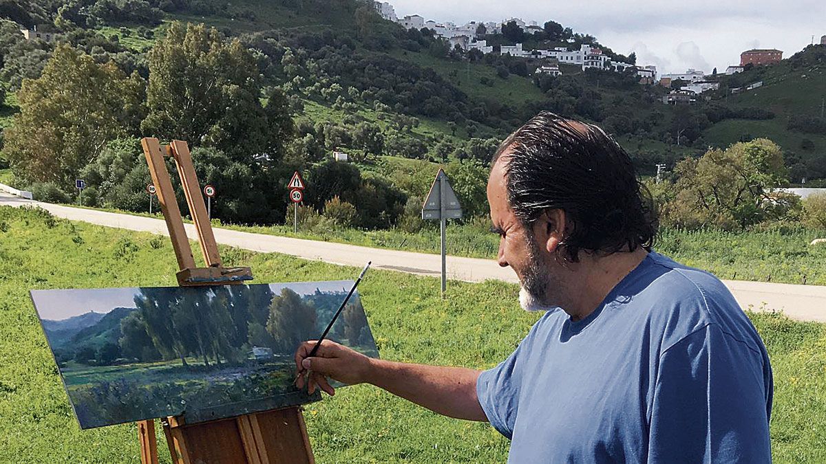 Fermín García Sevilla pintando del natural en sus frecuentes salidas al campo.